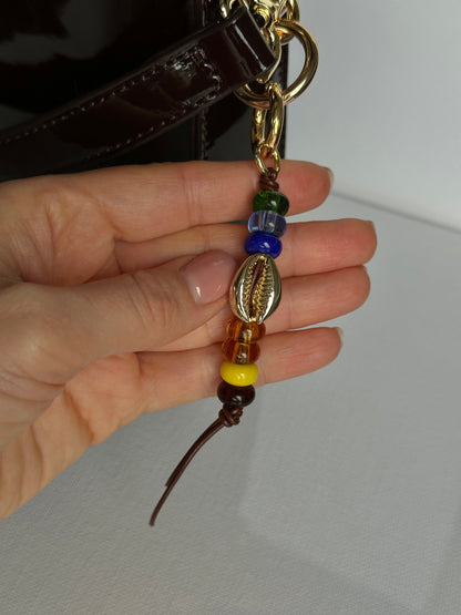 COWRIE bag charm